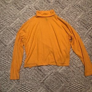 Bright yellow turtle neck